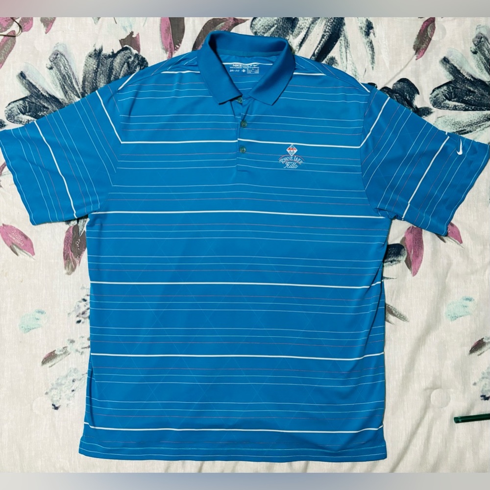 Nike Dri-fit Polo. Striped Blue, Orange, amd teal. Unworn but no tags. Size XL.